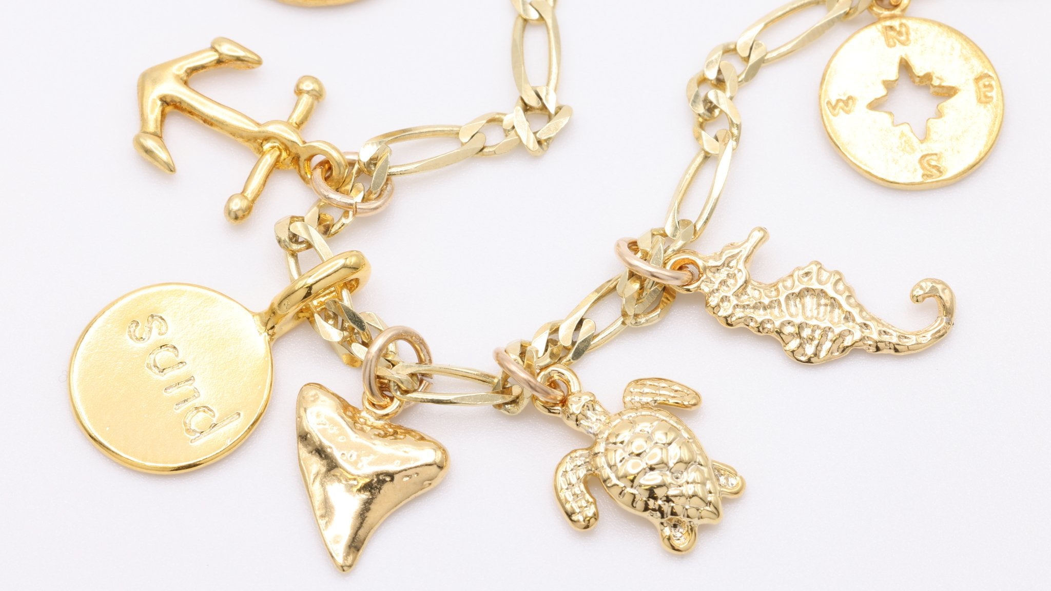 Why 14K Charms are Best for Charm Bracelets - GoldandWillow